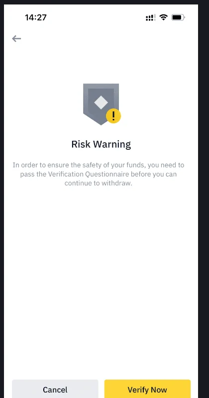 Binance-ի պաշտոնական էջի օրինակային էկրանը բջջային հավելվածից՝ Risk Warning պատուհան, որը հայտնում է, որ դուրսբերումը շարունակելու համար պետք է անցնել ստուգման հարցաշարը, ներքևում՝ Cancel և Verify Now կոճակները